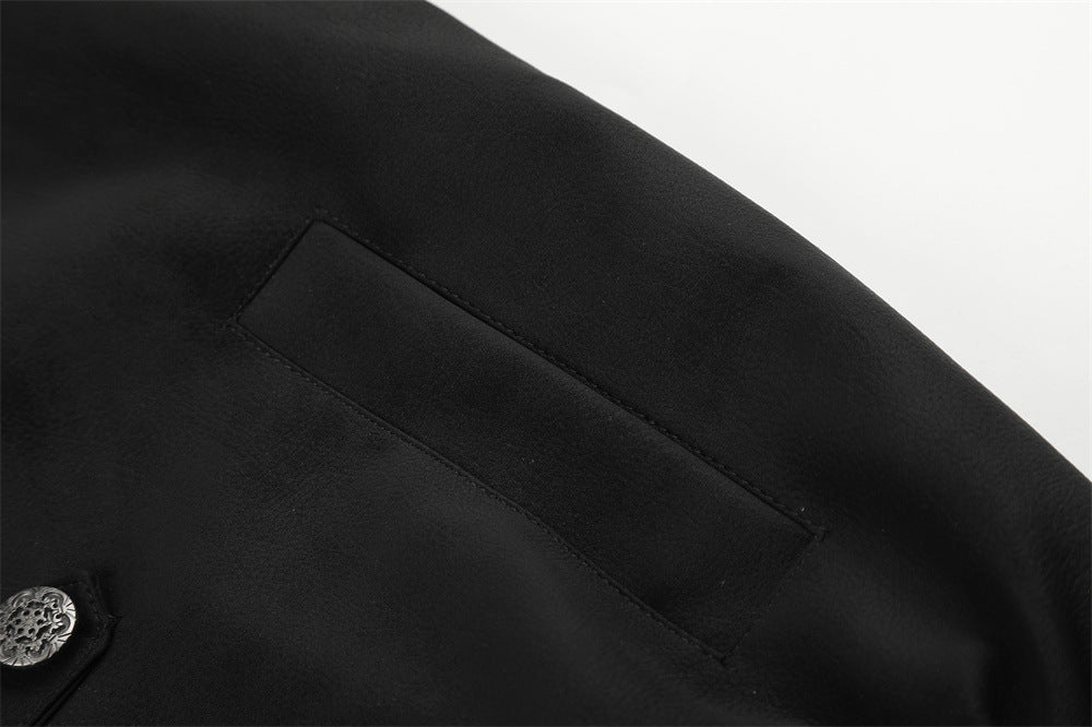 Black oversized outerwear with decorative silver buttons