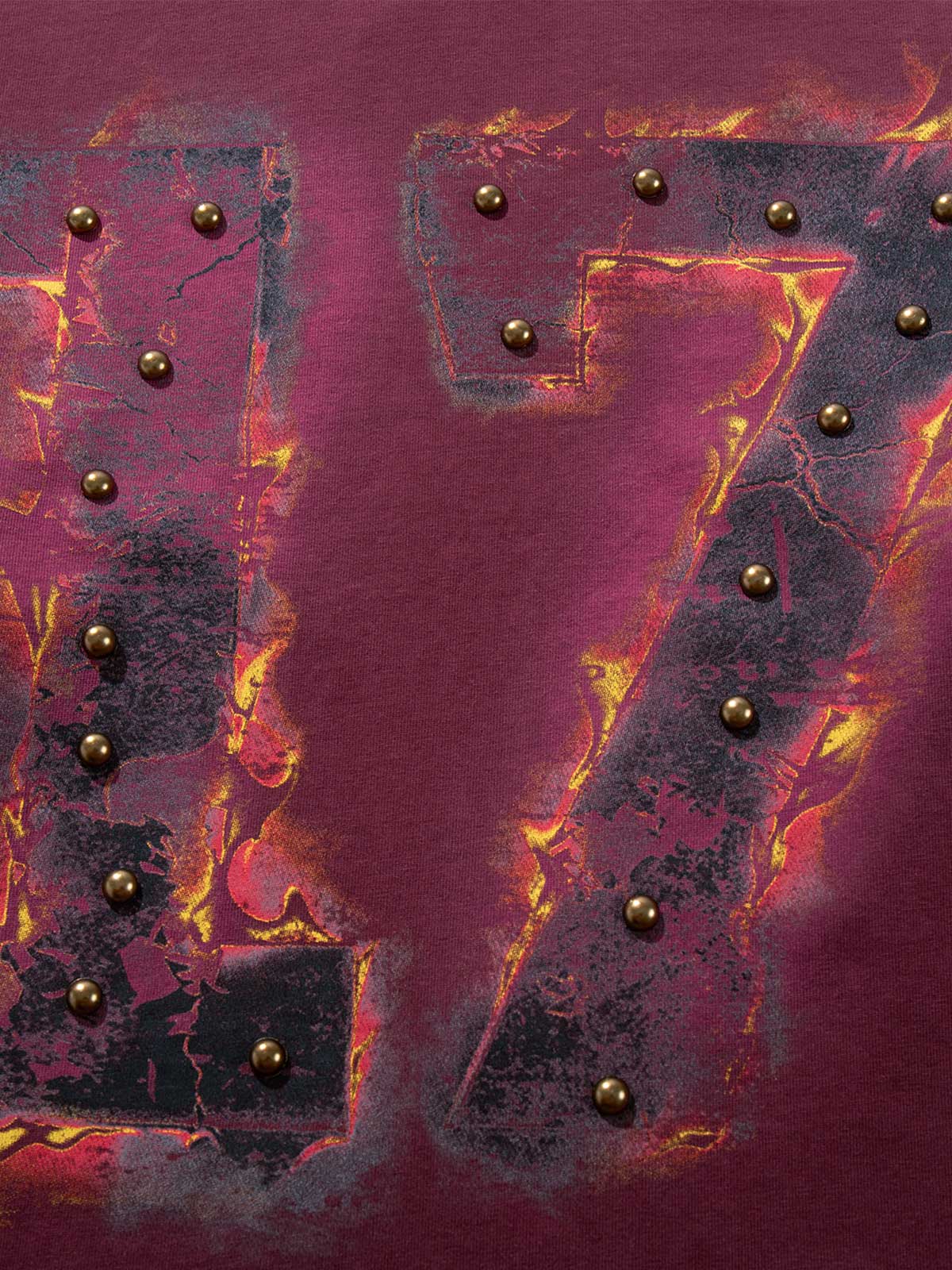 Flame graphic studded T-shirt presented as a casual everyday layer
