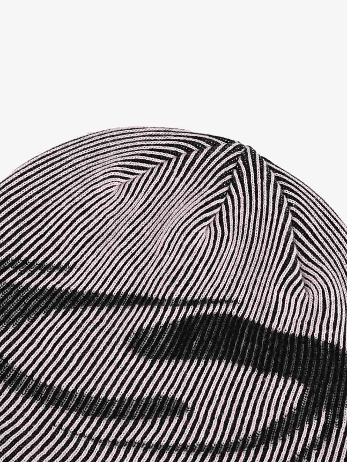 Full view of the striped graphic beanie with spike detail