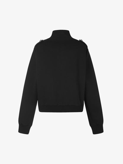 Back view of the boxy fit jacket with clean structured lines