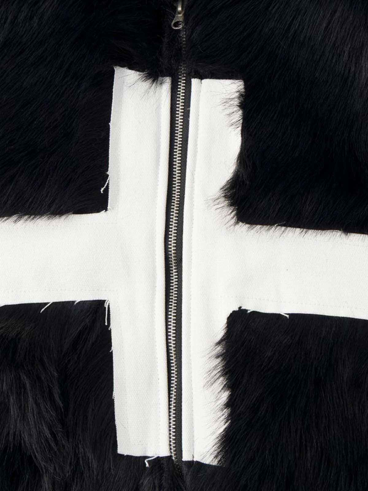 Front view of the camouflage track jacket with a sporty design