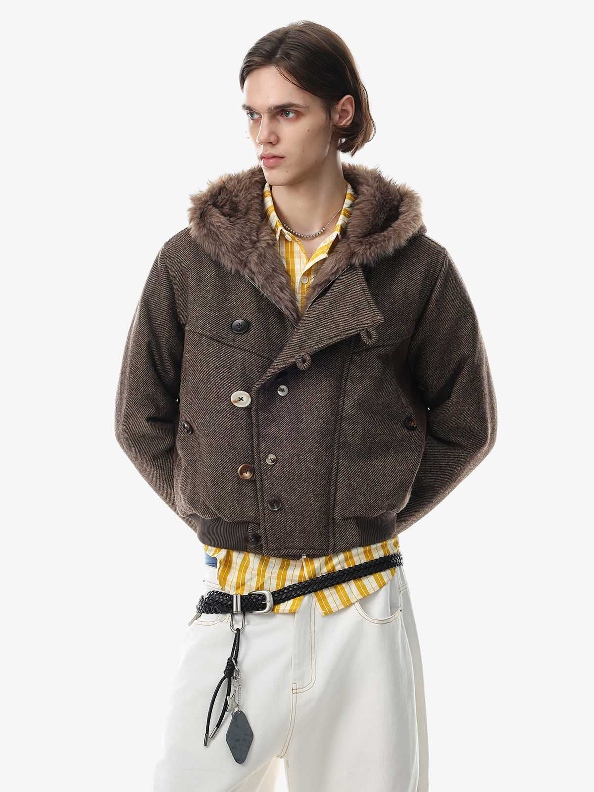 Detail of the soft faux-fur texture on the hooded coat