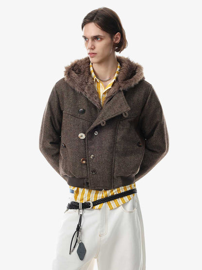 Detail of the soft faux-fur texture on the hooded coat