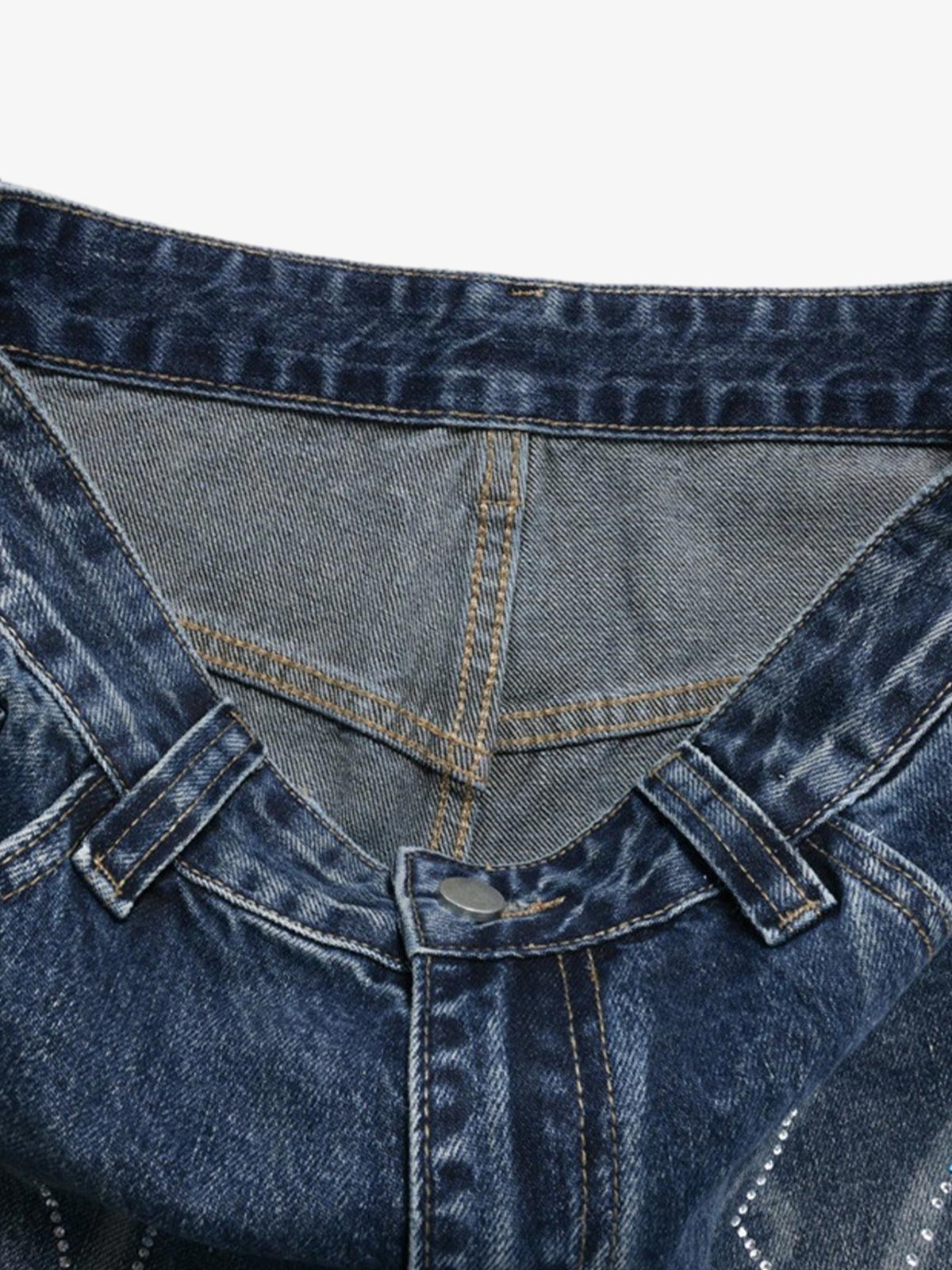 Curved-leg jeans displaying the whiskered denim finish