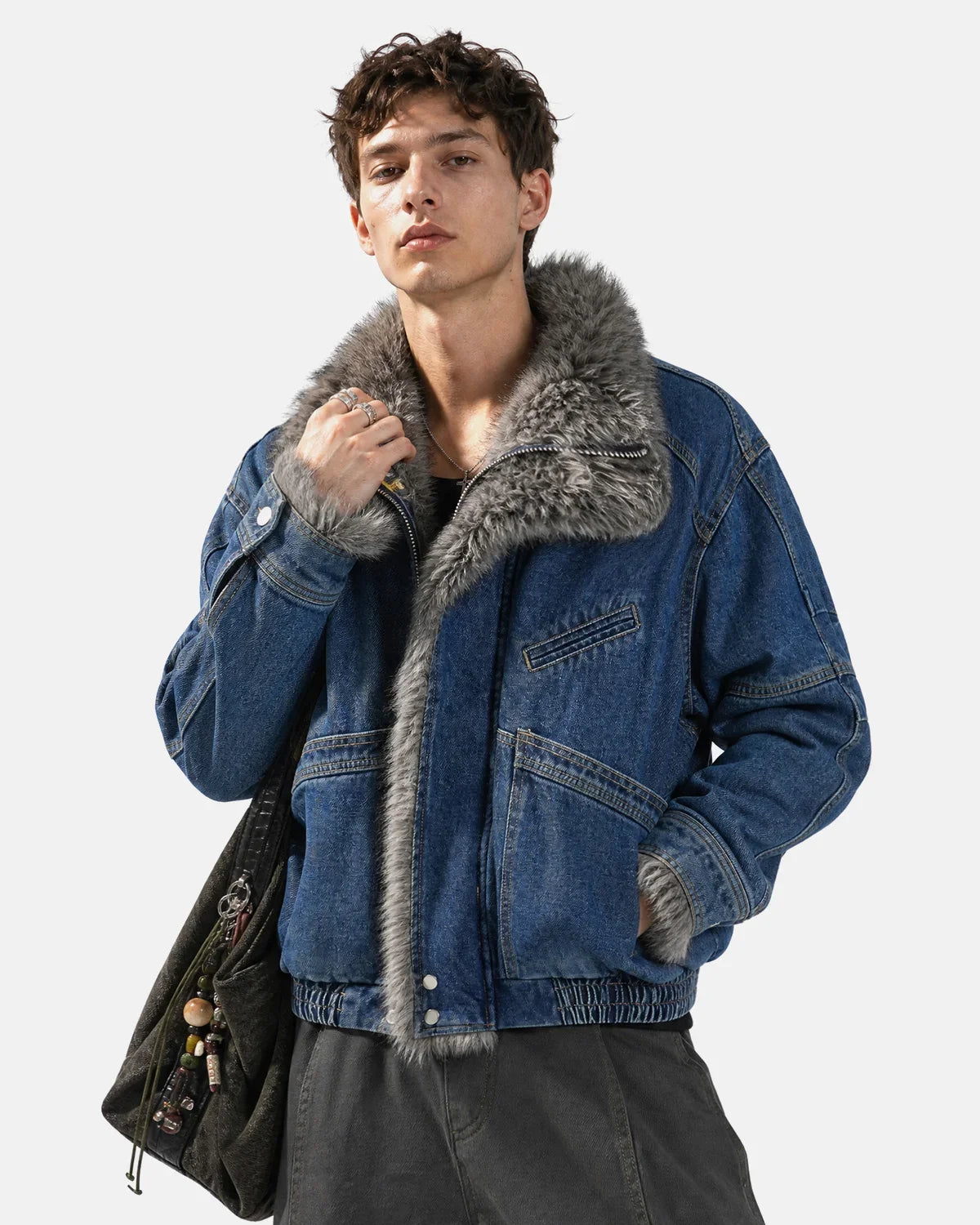 Faux fur padded denim jacket showing its relaxed boxy silhouette