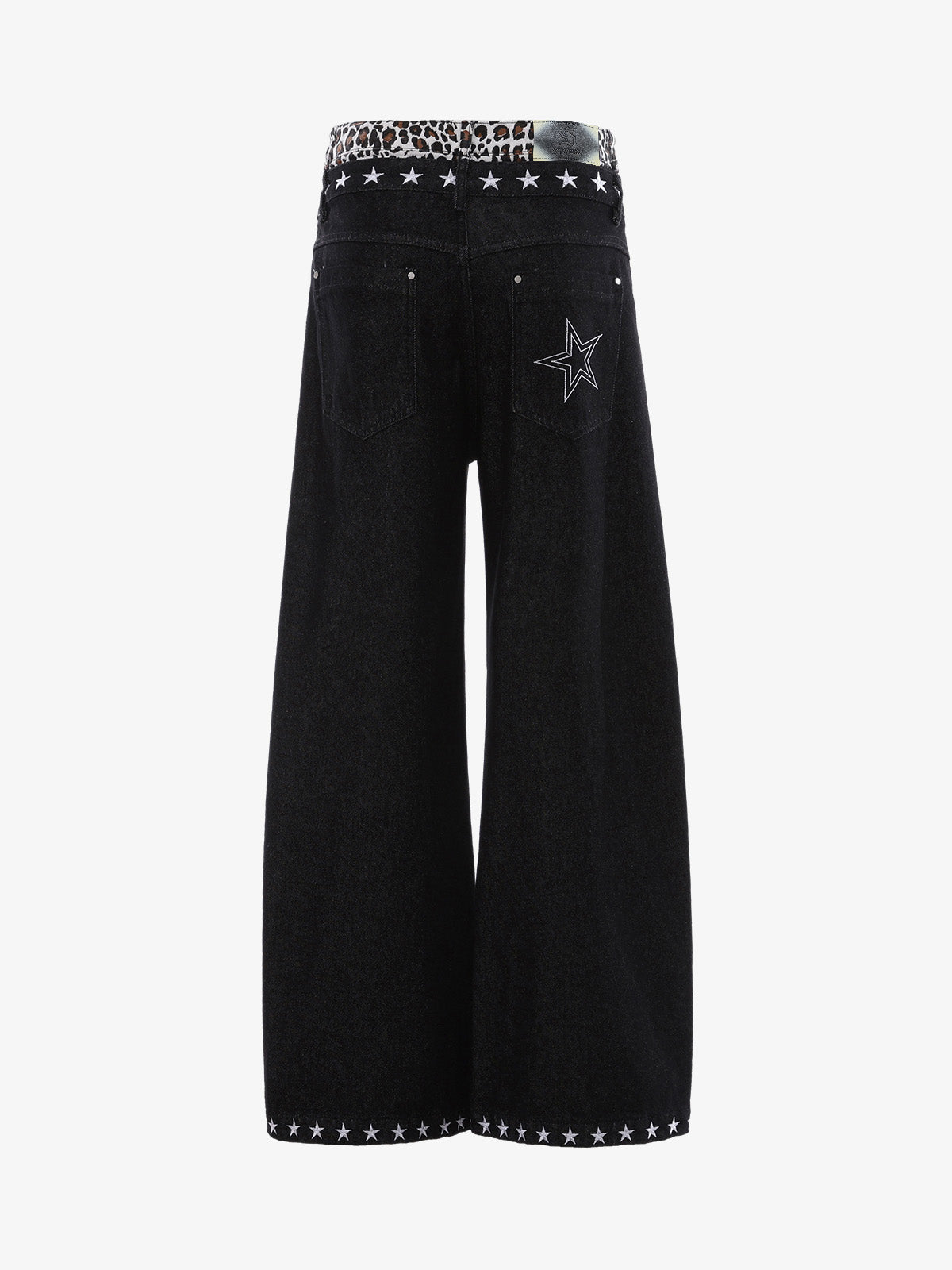 Close-up of the leopard trim and star stitching on wide-leg jeans