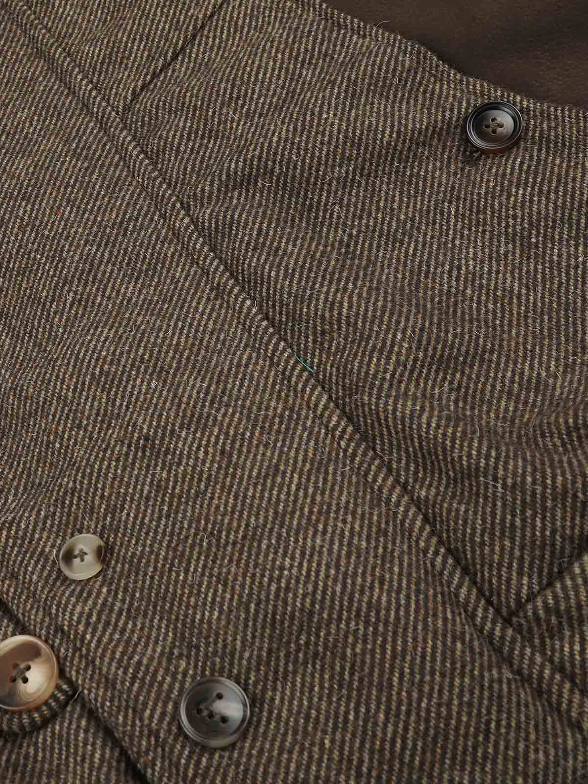 Full-length view of the hooded coat styled for winter