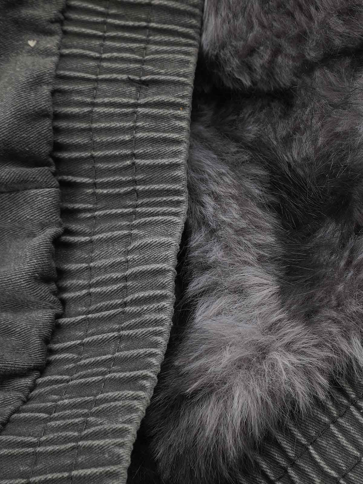 Sleeve and cuff detail on the washed bomber coat