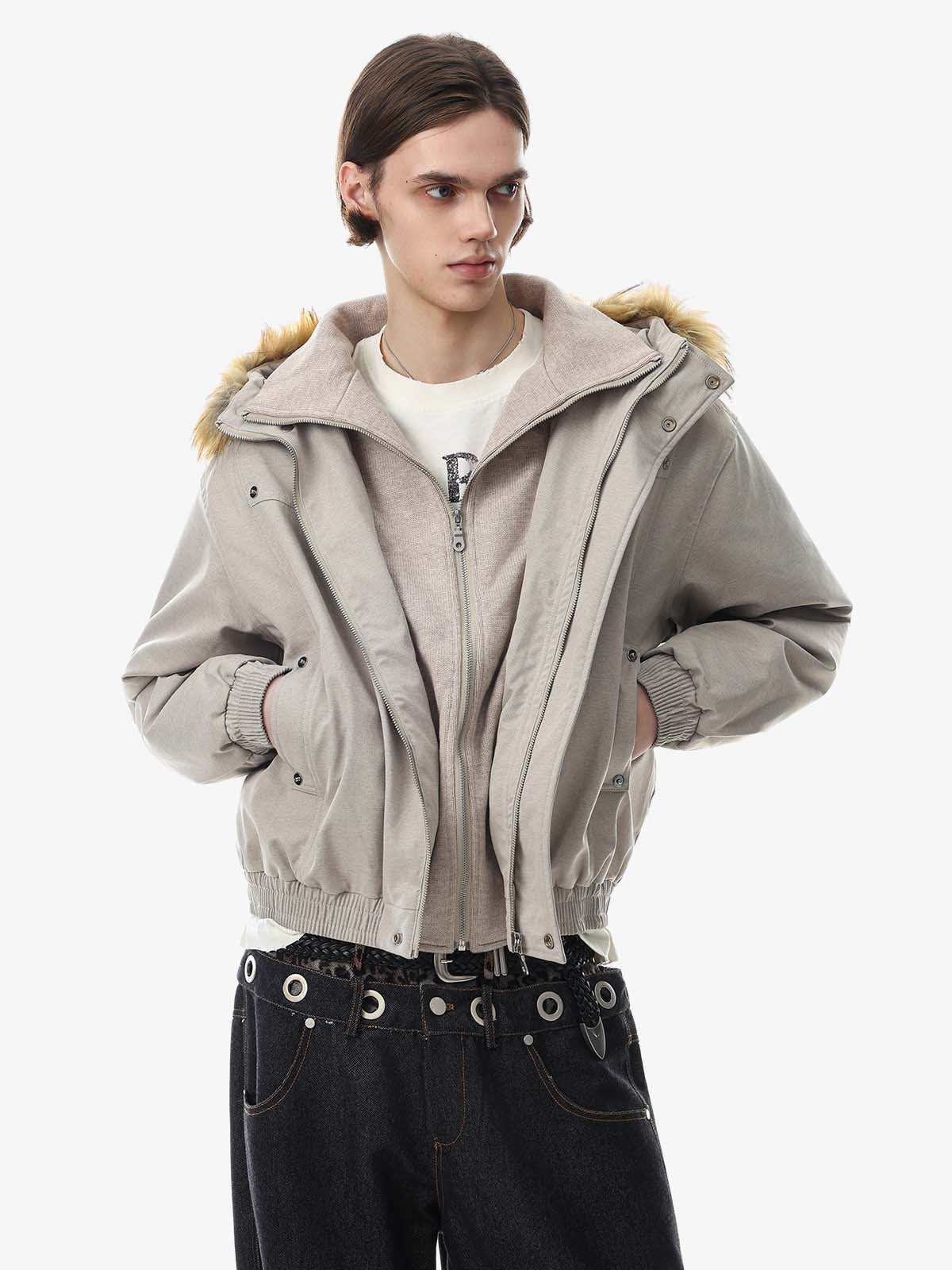 Front view of a camouflage track jacket with a stand-up collar