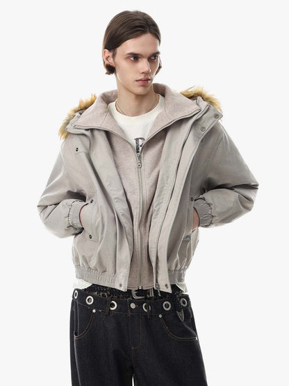 Front view of a camouflage track jacket with a stand-up collar
