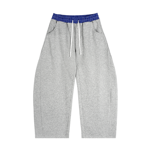 Plaid waistband barrel-leg sweatpants shown from the front