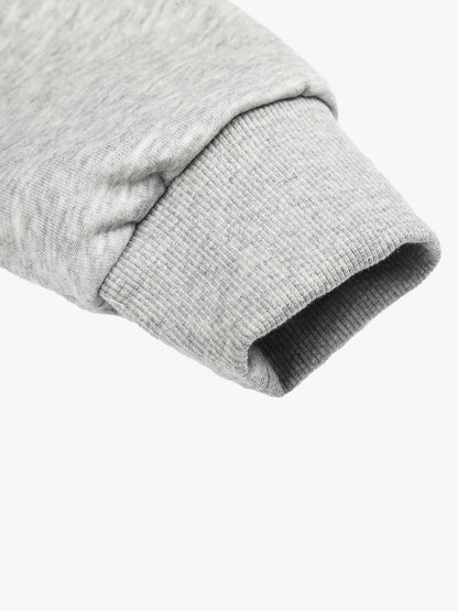 Detailed view of the button front and tailored shape of the jacket