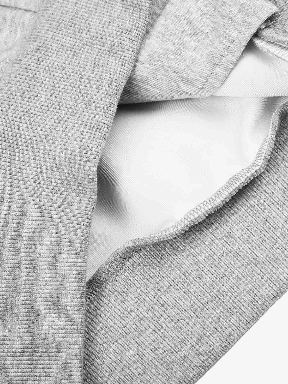 Jacket collar and shoulder detail in a military-inspired design