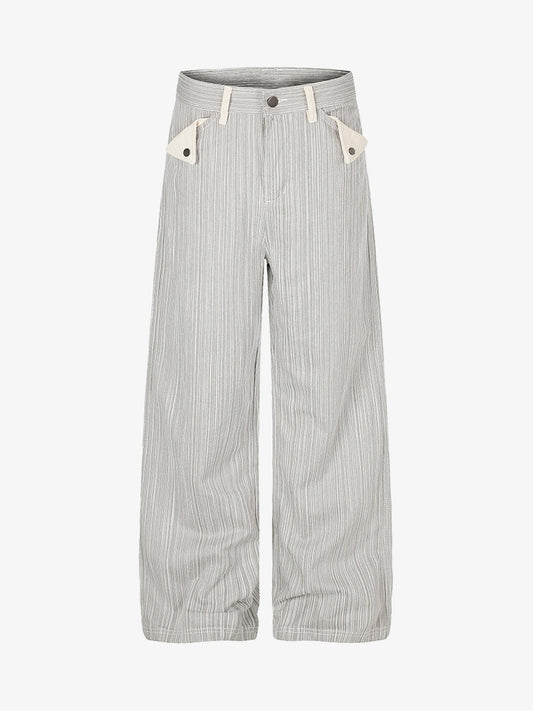 Wide-leg jeans with a bold graphic print and chain pocket details
