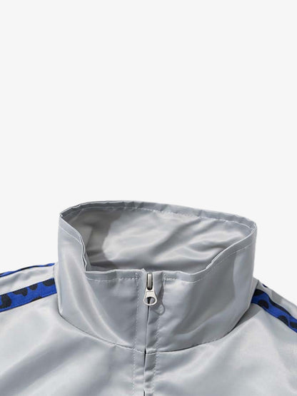 Detail of the leopard-print trim on the butterfly satin zip jacket