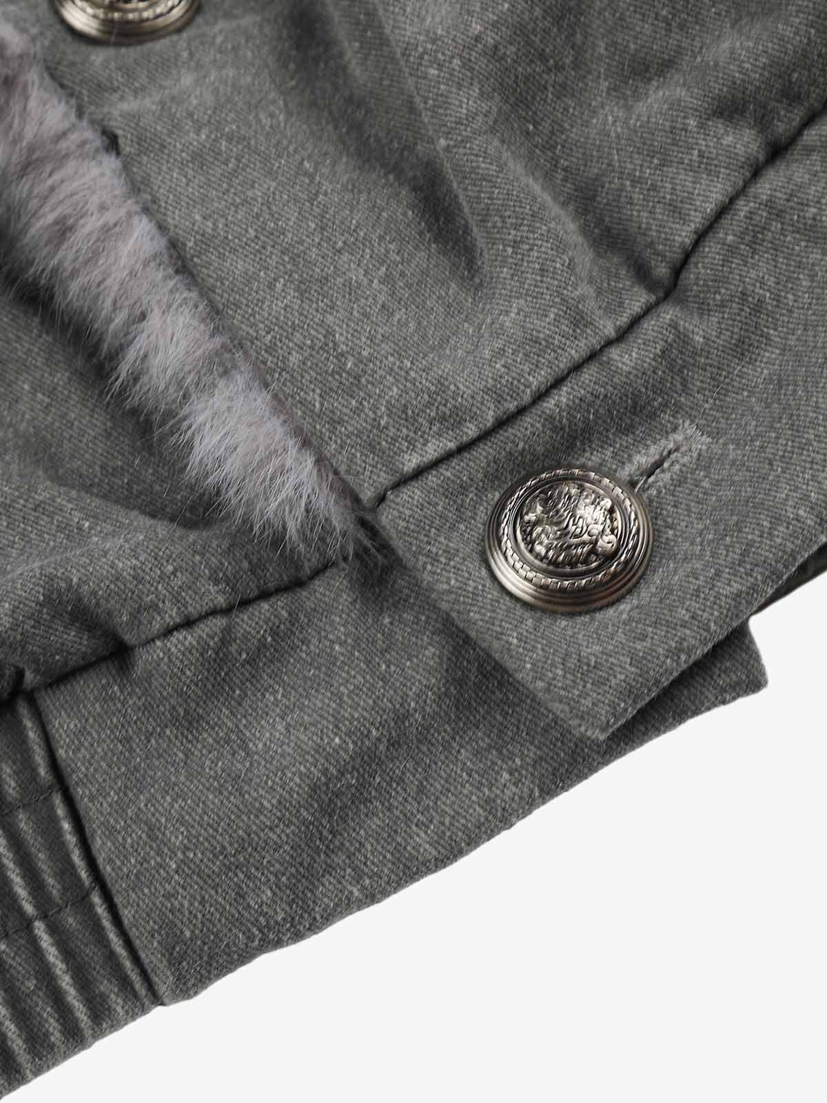 Close-up of the textured washed fabric on the bomber coat