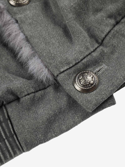 Close-up of the textured washed fabric on the bomber coat