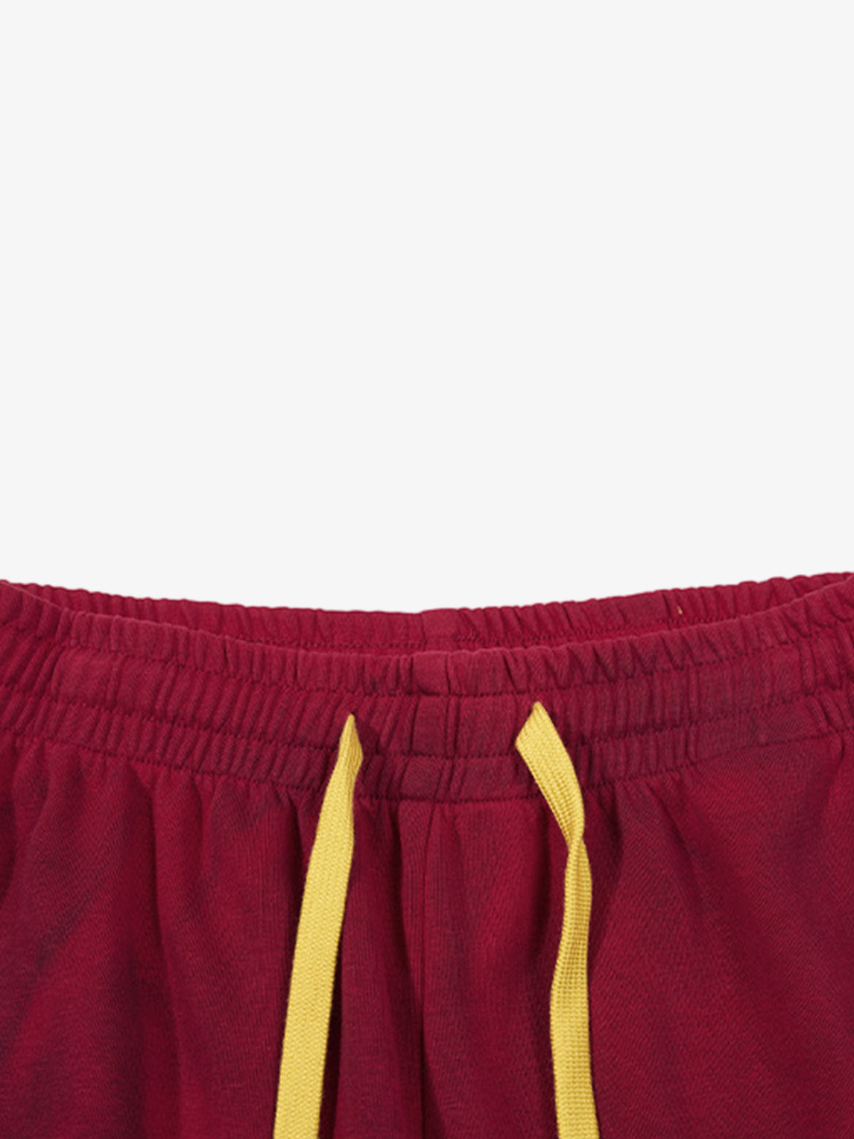 Crest graphic detail on the leg of the sweatpants