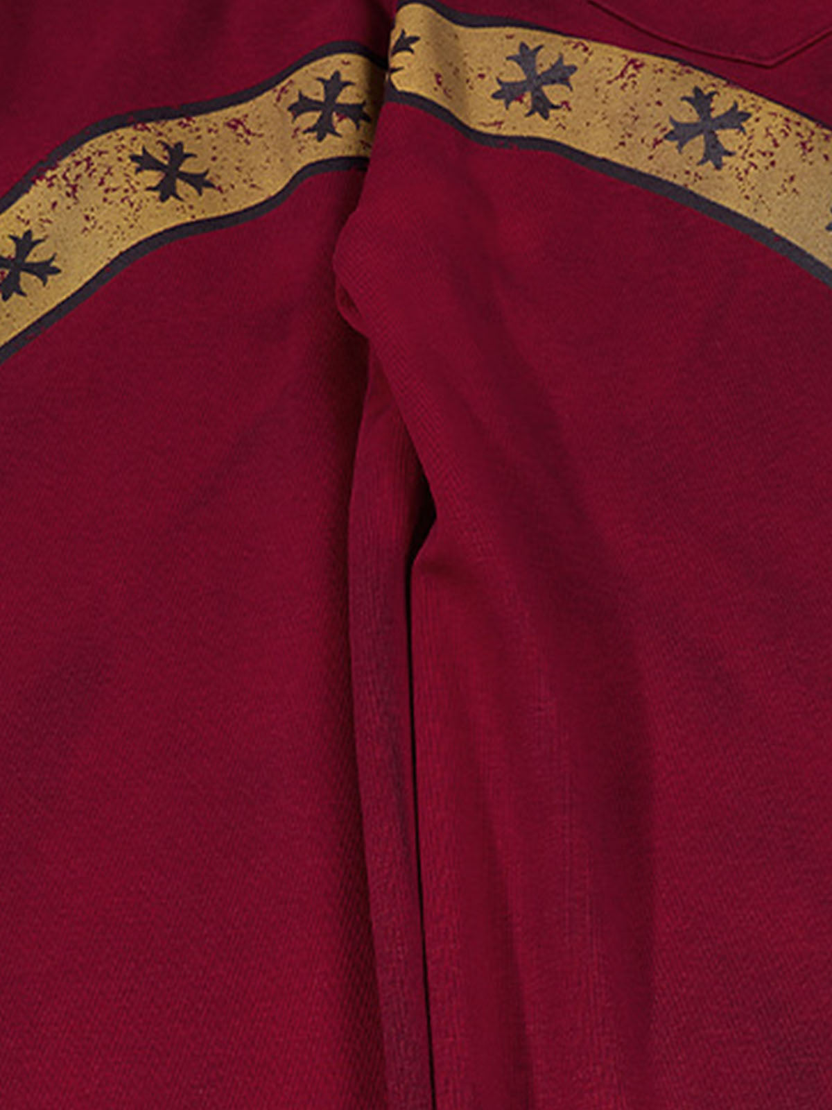 Full view of casual sweatpants with crest graphic