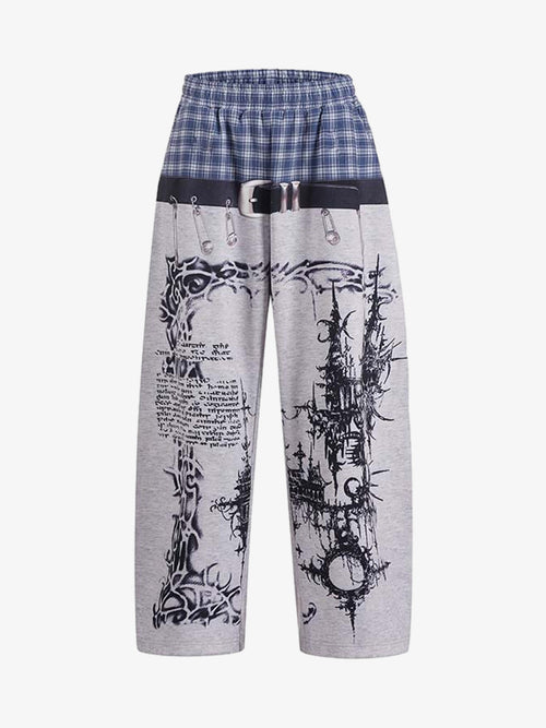 Wide-leg graphic sweatpants with a plaid waistband shown from the front