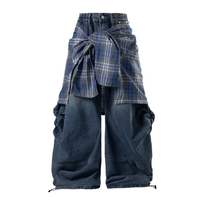 Side view of relaxed-fit plaid layer jeans