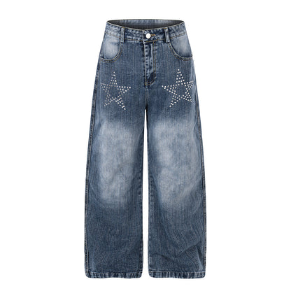 Close-up of rhinestone star detailing on baggy jeans