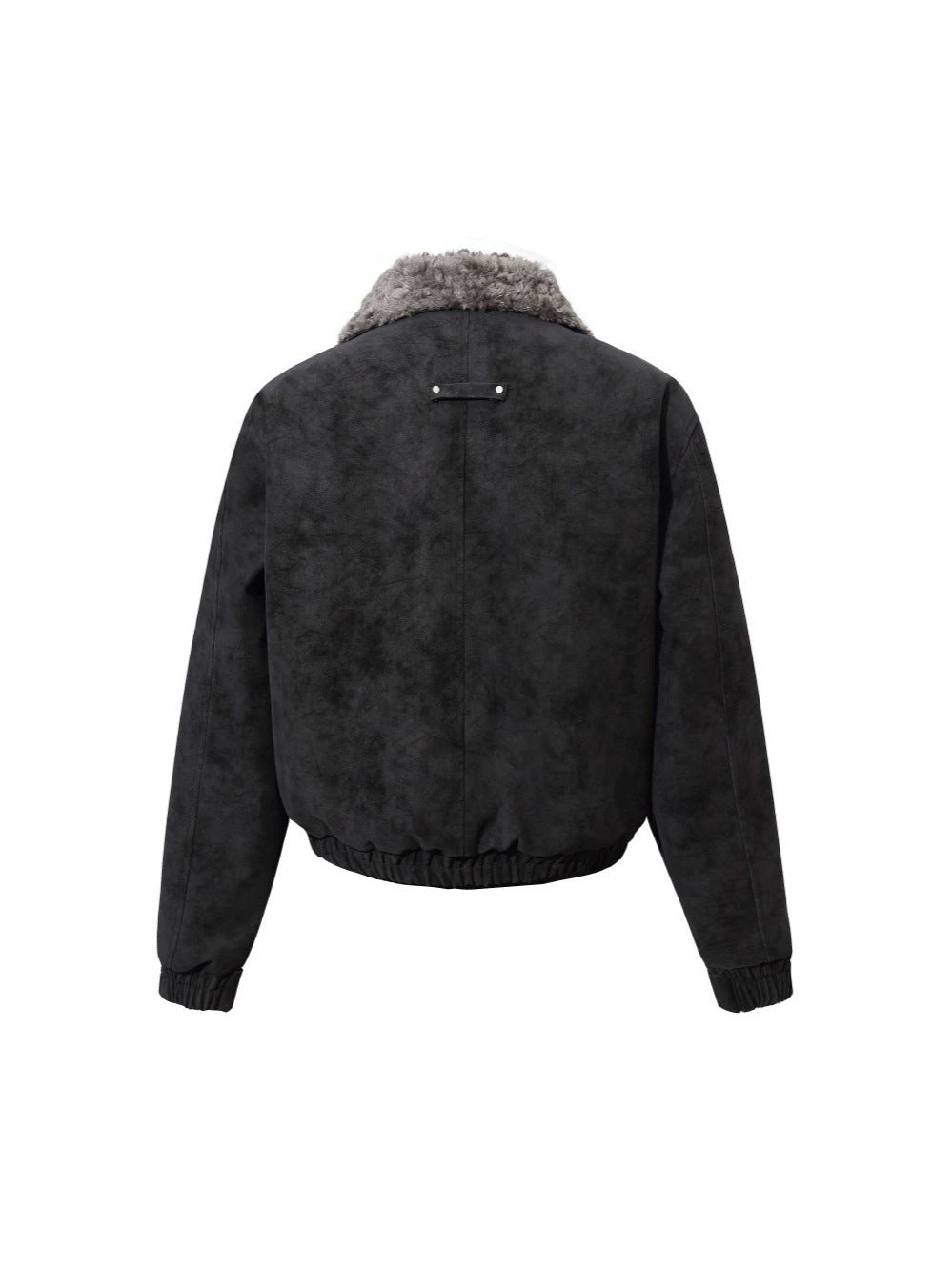 Detailed view of the quilted suede texture on the jacket