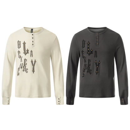 Front view of a long-sleeve gothic Henley shirt with stud detailing