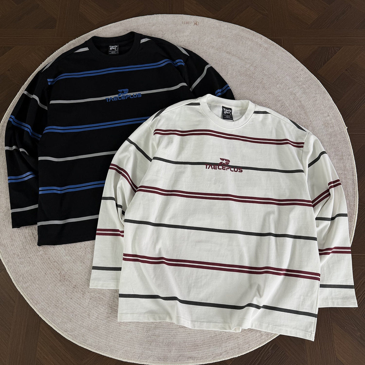 Two colour options of an oversized striped mock neck shirt