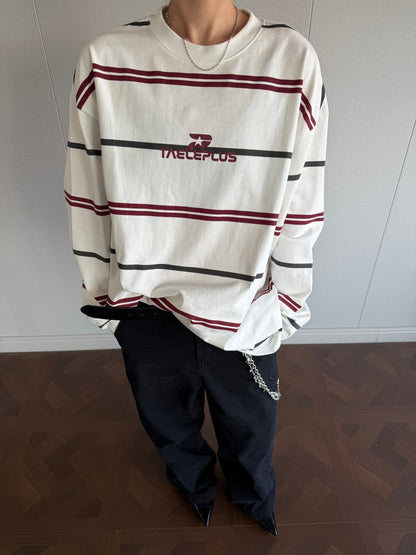 Front view of a red and white striped mock neck shirt