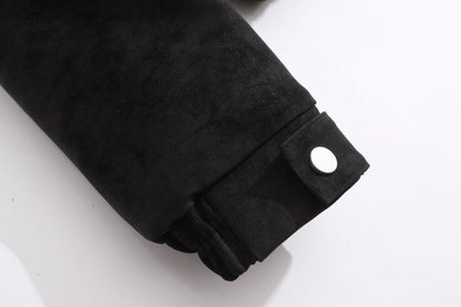 Close-up of the suede fabric and quilted stitching