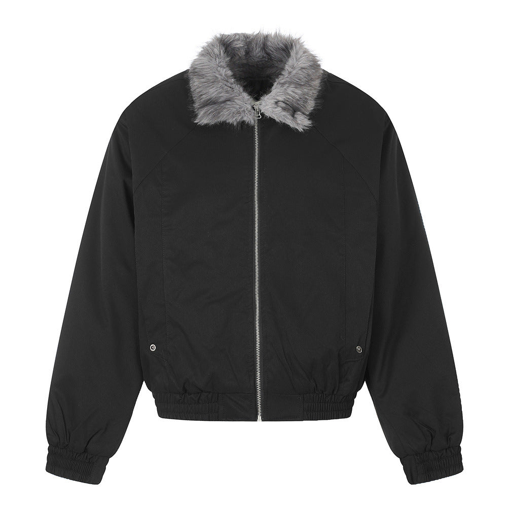 Detail of the front fastening on a padded bomber jacket