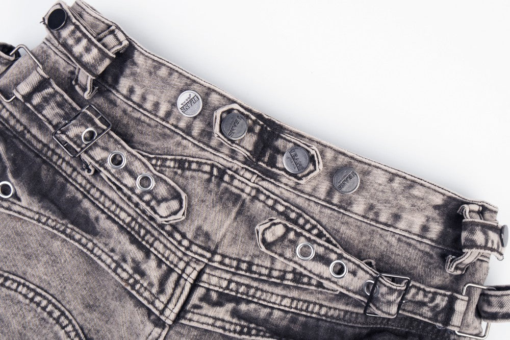 Detail of the washed denim texture on the wide leg jeans