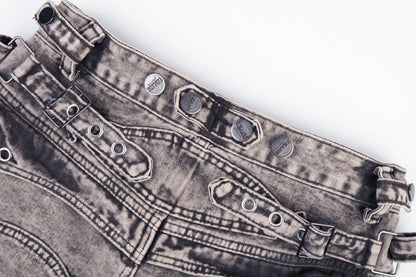 Detail of the washed denim texture on the wide leg jeans