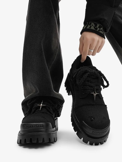 Pair of chunky denim trainers shown from a three-quarter angle