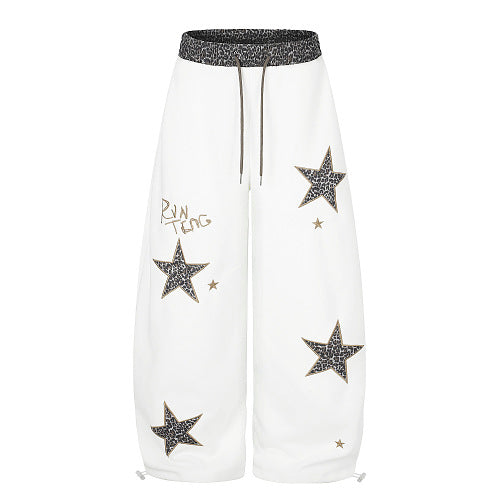 Leopard star sweatpants featuring a bold all-over print