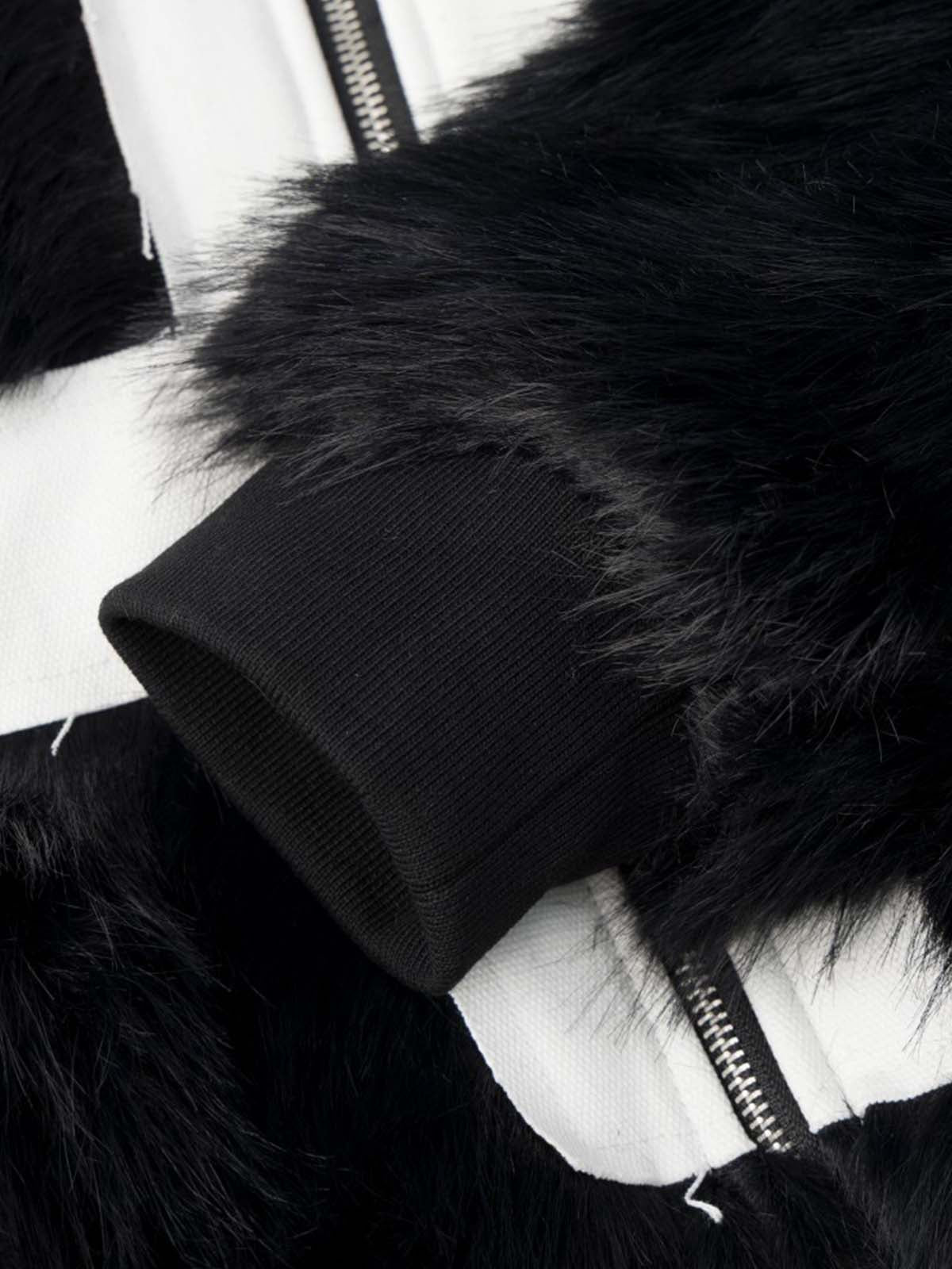 Close-up of the stand-up collar on the camouflage track jacket