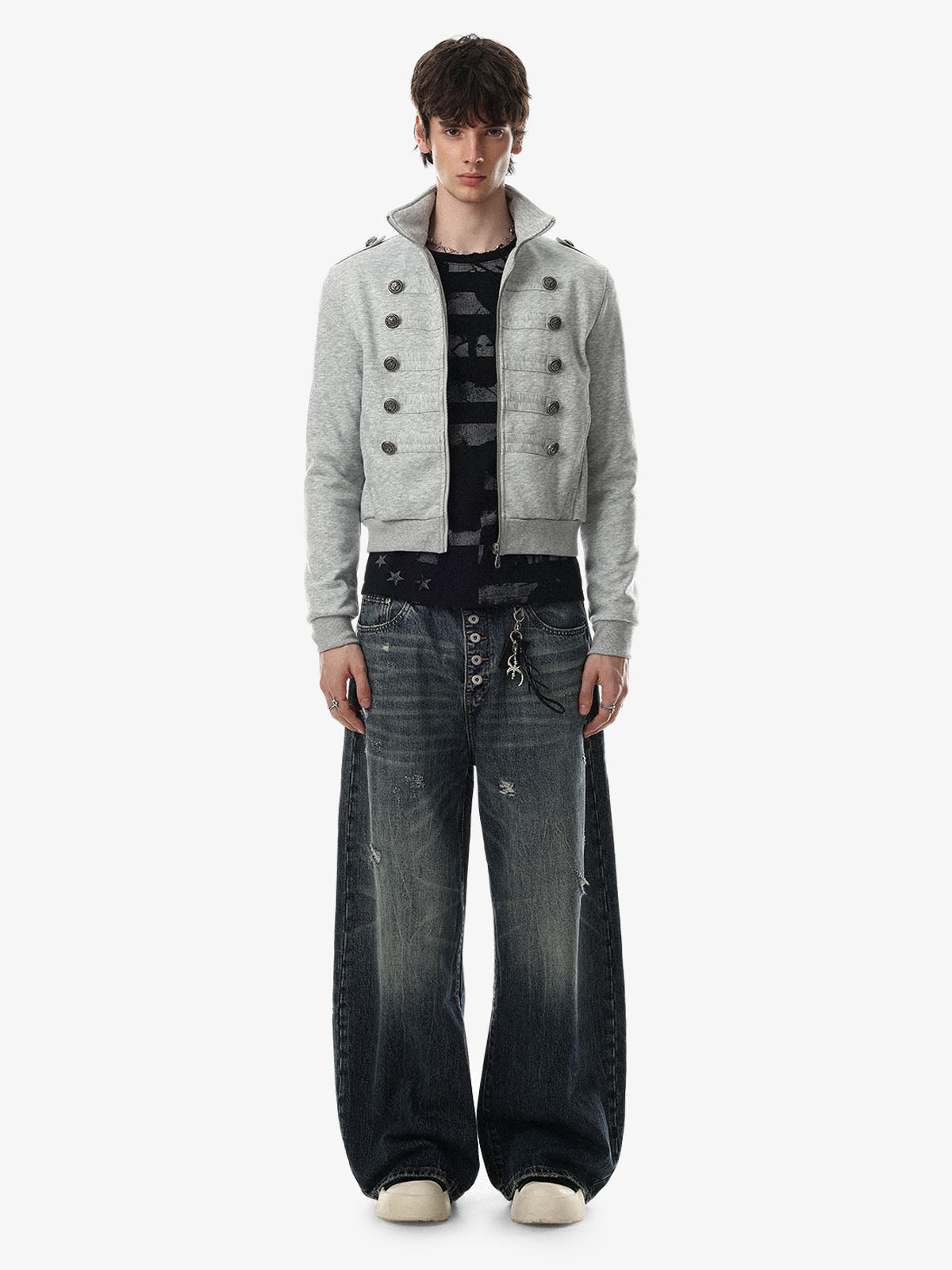 Front view of a structured boxy jacket with military-inspired buttons