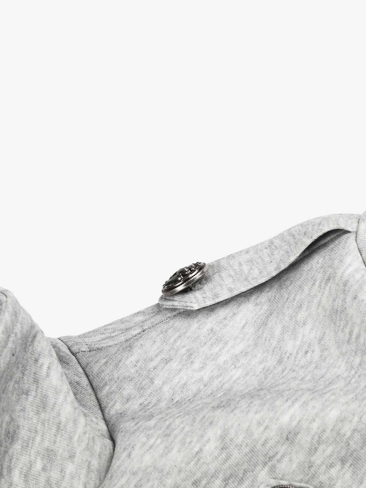 Full-length view of the double-breasted boxy jacket styled for layering