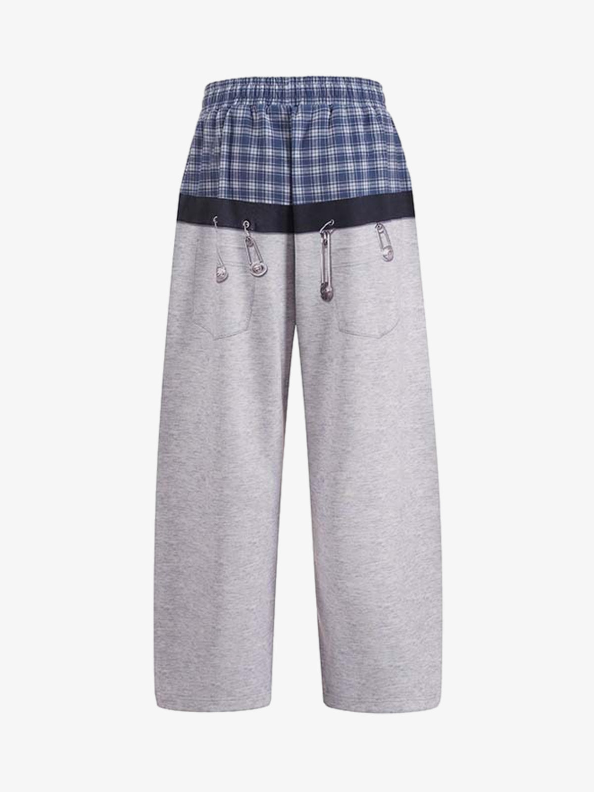 Graphic sweatpants displaying the wide-leg silhouette and plaid waistband