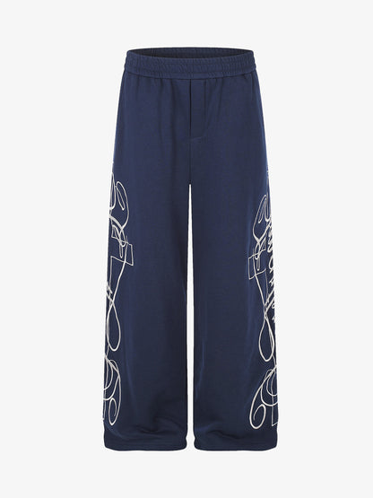 Floral graphic wide-leg sweatpants shown from the front