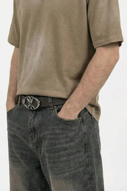 Close-up of the star and cross details on the fashion belt