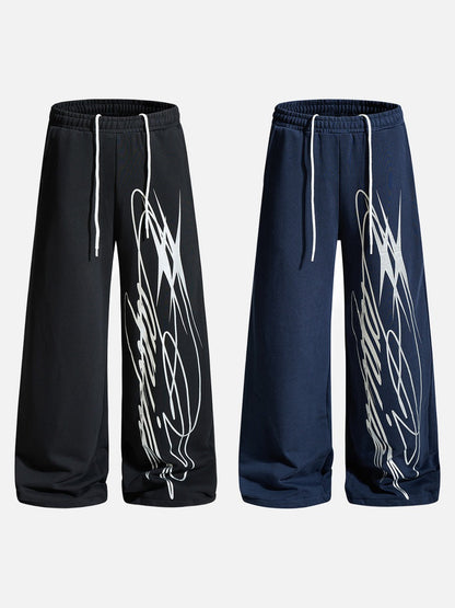 Side view of relaxed sweatpants with a graphic multi-line pattern