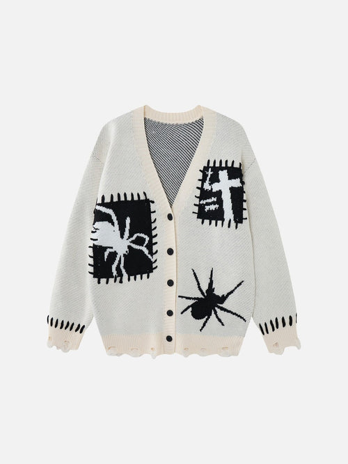 Oversized black and white graphic knit cardigan shown from the front