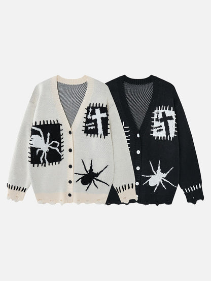 Black and white cardigan displayed with its bold graphic design