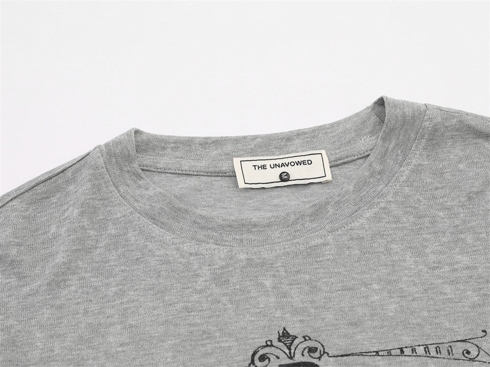 Winged graphic long-sleeve T-shirt styled with a casual streetwear outfit