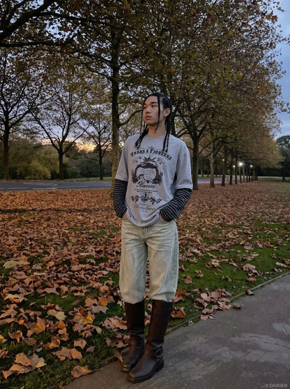 Baroque winged graphic long-sleeve T-shirt displayed on a model