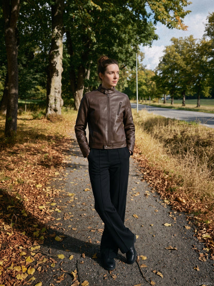 Brown faux leather biker jacket showing its structured lapels