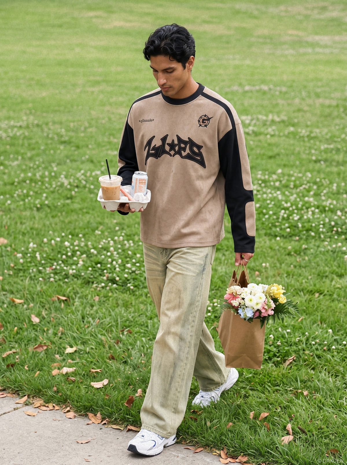 Graphic long-sleeve top styled for a casual everyday outfit