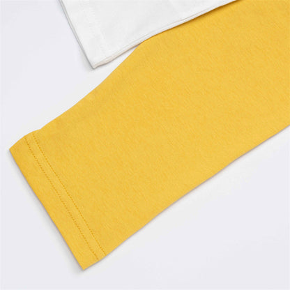 White and yellow raglan T-shirt styled for a casual outfit